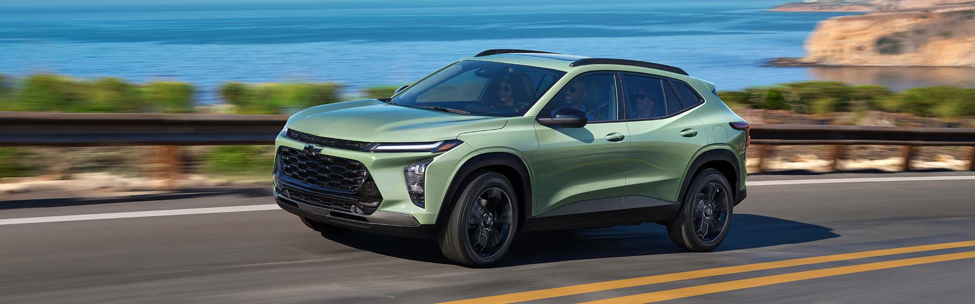 A 2021 Chevrolet Blazer driving along a scenic road.
